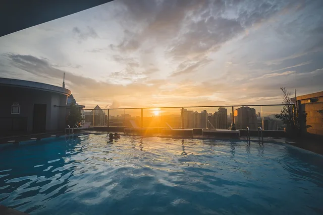 swimming pool, city, sunset, building, nature, pool, skyline. HOA pool contracts in Phoenix compared with Las Vegas