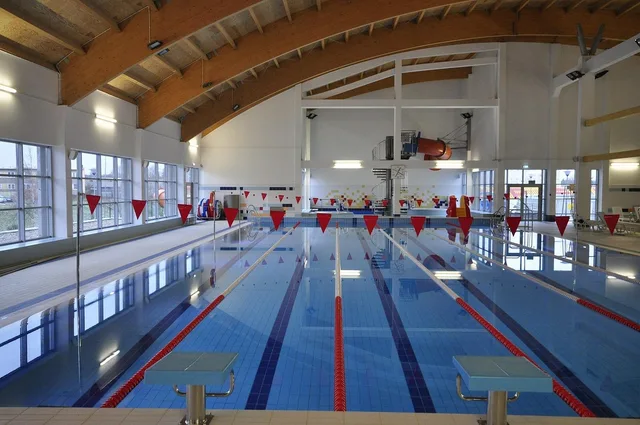 zagan, poland, pool, swimming, water, building, inside, interior, architecture, recreation, sports, ceiling, exercise, lanes, nature, flags, lights, reflections, lighting. Pool service hiring: three triggers and the training ladder