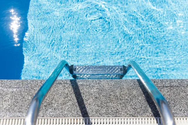 ladder, pool, swimming pool, outdoors, clean, clear, deep, entrance, fitness, floor, holiday, hotel, lifestyle, pool, pool, swimming pool, swimming pool, swimming pool, swimming pool, swimming pool. Pool service wages and the real cost of labour in 2027