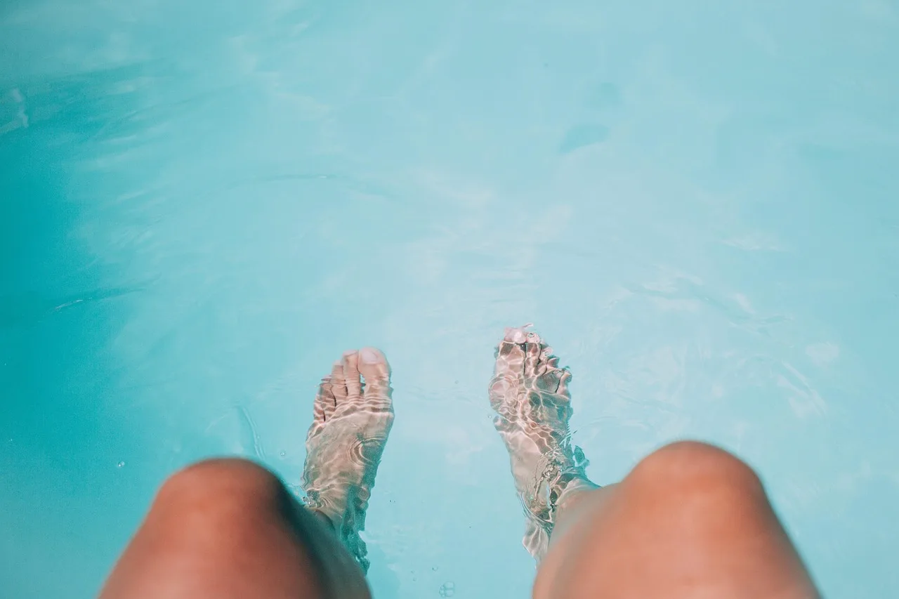 feet, legs, swimming pool, submerged, leisure, outdoors, person, pool, nature, relaxation, summer, turquoise, vacation, water, wet. Tools and KPIs for running a pool service business in 2027