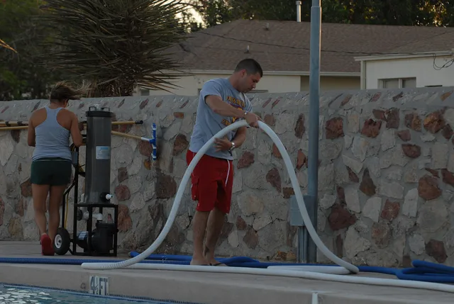Bobby G. Carrasquillo Jr., a lifeguard and recreation aid for the Morale, Welfare and Recreation, starts wrapping cleaning pool water hose after morning cleanup at the community pool at Fort Bliss, Texas, June 20, 2012. Carrasquillo is an Army veteran who served four years of active duty service. Pool Service Startup: How Density and Season Shape a Route